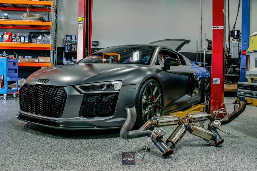 Audi R8 on a lift with performance exhaust ready to install